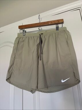 Nike Olive Green Athletic Running Shorts with White Swoosh